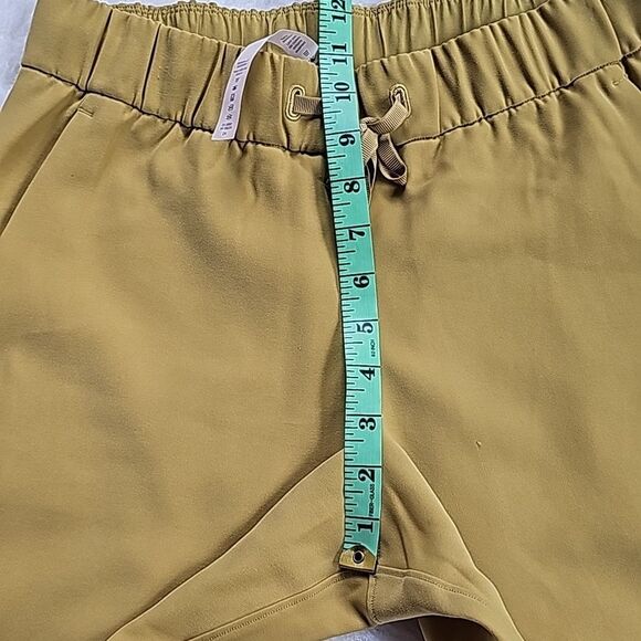 Lululemon On the Fly Crop Pants *Woven 23" Vintage Gold Yellow Mustard Size 6 - Picture 12 of 12